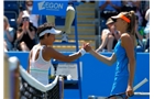 BIRMINGHAM, ENGLAND - JUNE 12:  Kimiko Date-Krumm of Japan is congratulated by  Daniela Hantuchova of Slovakia (R) after her victory during Day Four of the Aegon Classic at Edgbaston Priory Club on June 12, 2014 in Birmingham, England.  (Photo by Paul Thomas/Getty Images)